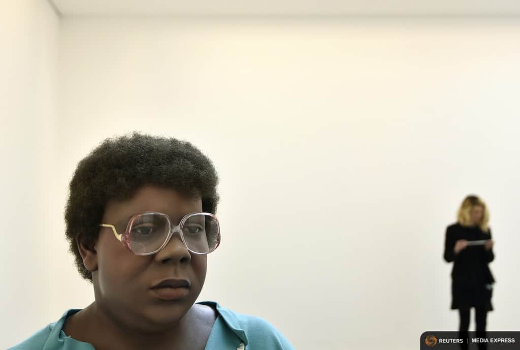 A sculpture entitled 'Queenie II' by the late U.S. artist Duane Hanson is exhibited at the Serpentine Sackler Gallery in London, June 1, 2015. Hanson's lifelike sculptures portraying working-class Americans and overlooked members of society are being brought together in the largest show of his work in Britain since 1997. REUTERS/Toby Melville